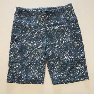 Senita athletic biker shorts that are white and blueish grey in color.